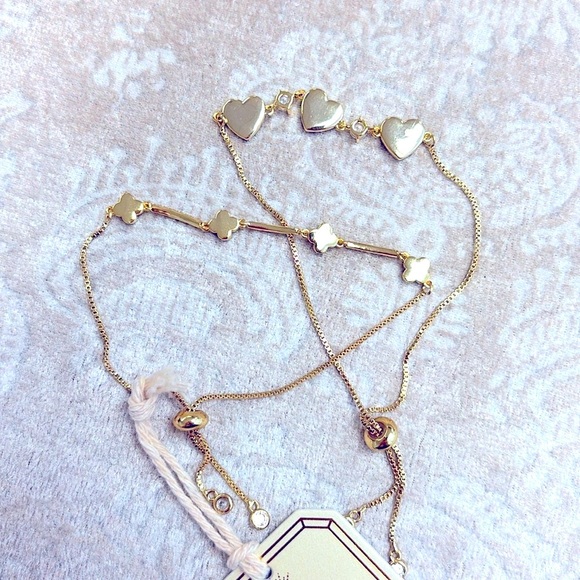 Brand New Eye Candy Set of 2 Gold Tone Adjustable Bracelets Hearts Clovers - Picture 6 of 13